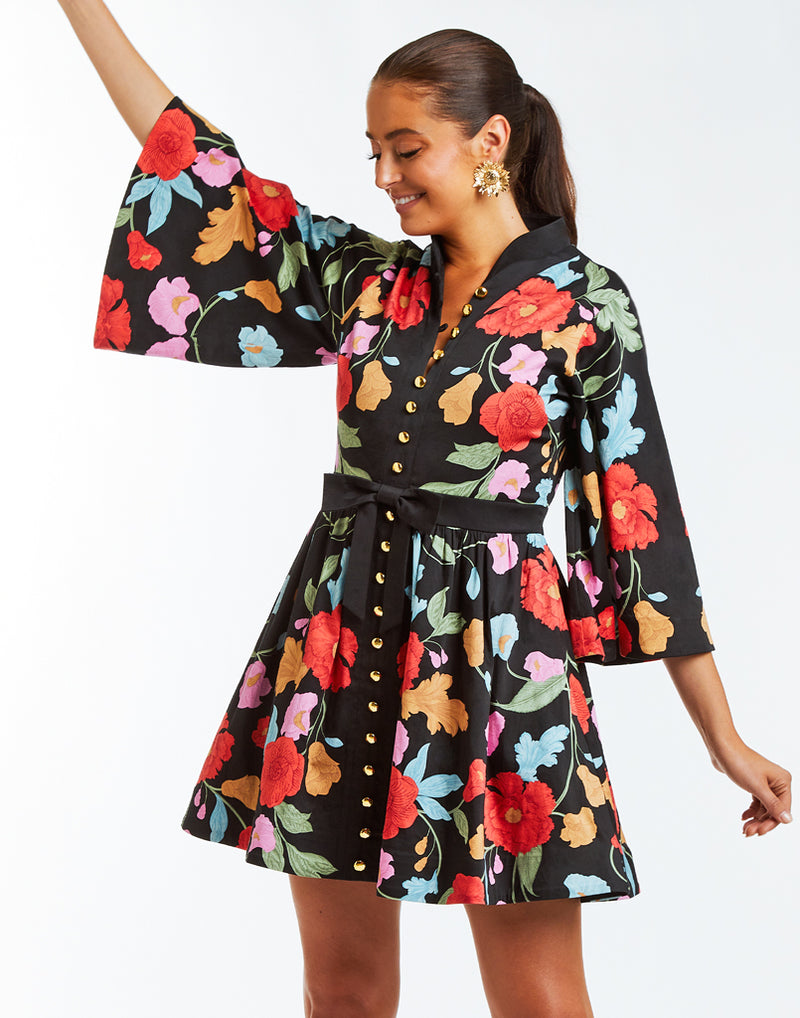 Fit and flare mini dress with bold floral print, Mandarin collar, and built-in bow belt.