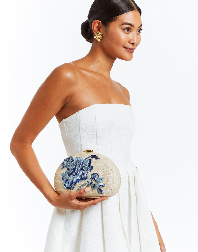 Rafe New York x Mestiza collaboration. Dome clutch with blue flower embroidered