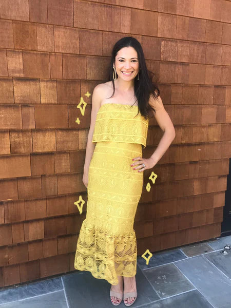 Vanessa Maffia wearing yellow dress from Mestiza