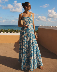 Alemais Gown in Huckleberry Blue linen organza with scoop neckline, adjustable straps, boned bodice, and fit-and-flare silhouette.