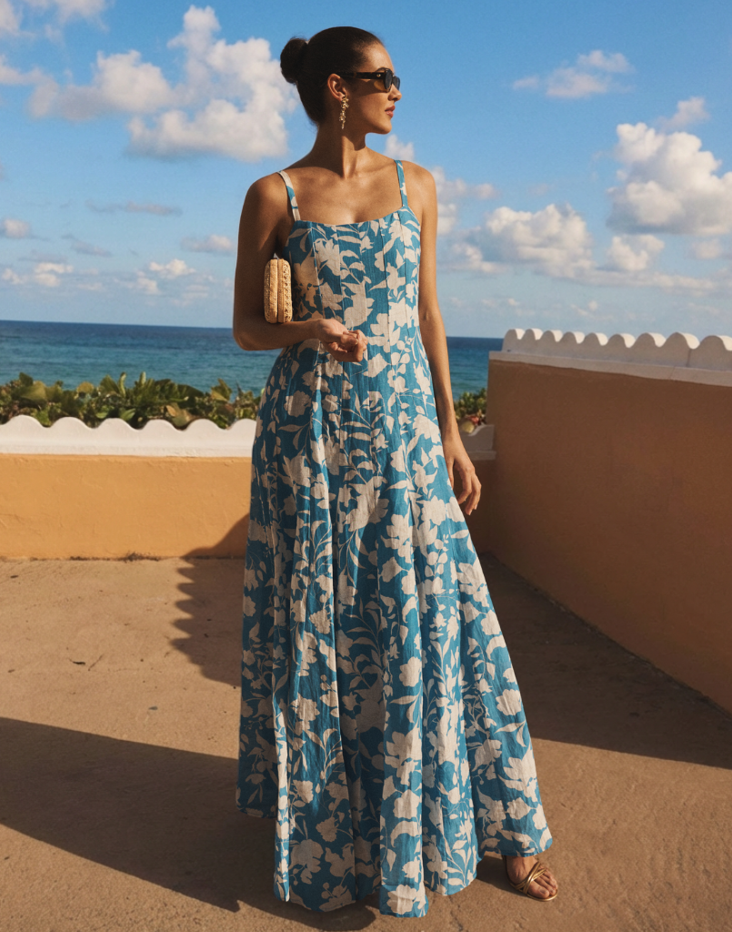 Alemais Gown in Huckleberry Blue linen organza with scoop neckline, adjustable straps, boned bodice, and fit-and-flare silhouette.