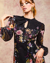 Ophelia Chiffon Gown in Twilight Florals front – chiffon evening gown with twisted keyhole neckline, sheer balloon sleeves, and cascading ruffle skirt by Mestiza New York.