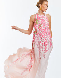 Pink evening halter  gown with cascading bow in rear. Dripping pink wisteria print on front. 