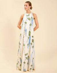 Adelina Gown in Wisteria Toile stretch crepe with halter neckline, cascading bow back detail, A-line silhouette, and hidden side pockets.