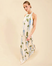 Adelina Gown in Wisteria Toile stretch crepe with halter neckline, cascading bow back detail, A-line silhouette, and hidden side pockets.