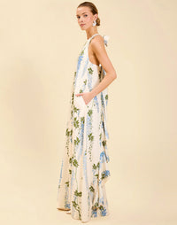 Adelina Gown in Wisteria Toile stretch crepe with halter neckline, cascading bow back detail, A-line silhouette, and hidden side pockets.