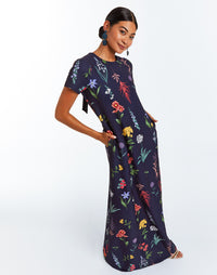 :Stretch crepe short sleeved maxi dress with side pockets in Venus Gardens floral print.