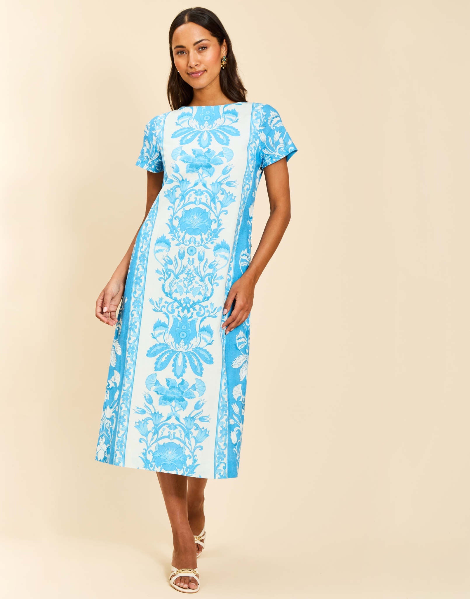 Adria Midi Dress in Florentine Blue linen with boat neckline, structured short sleeves, column silhouette, and side pockets.