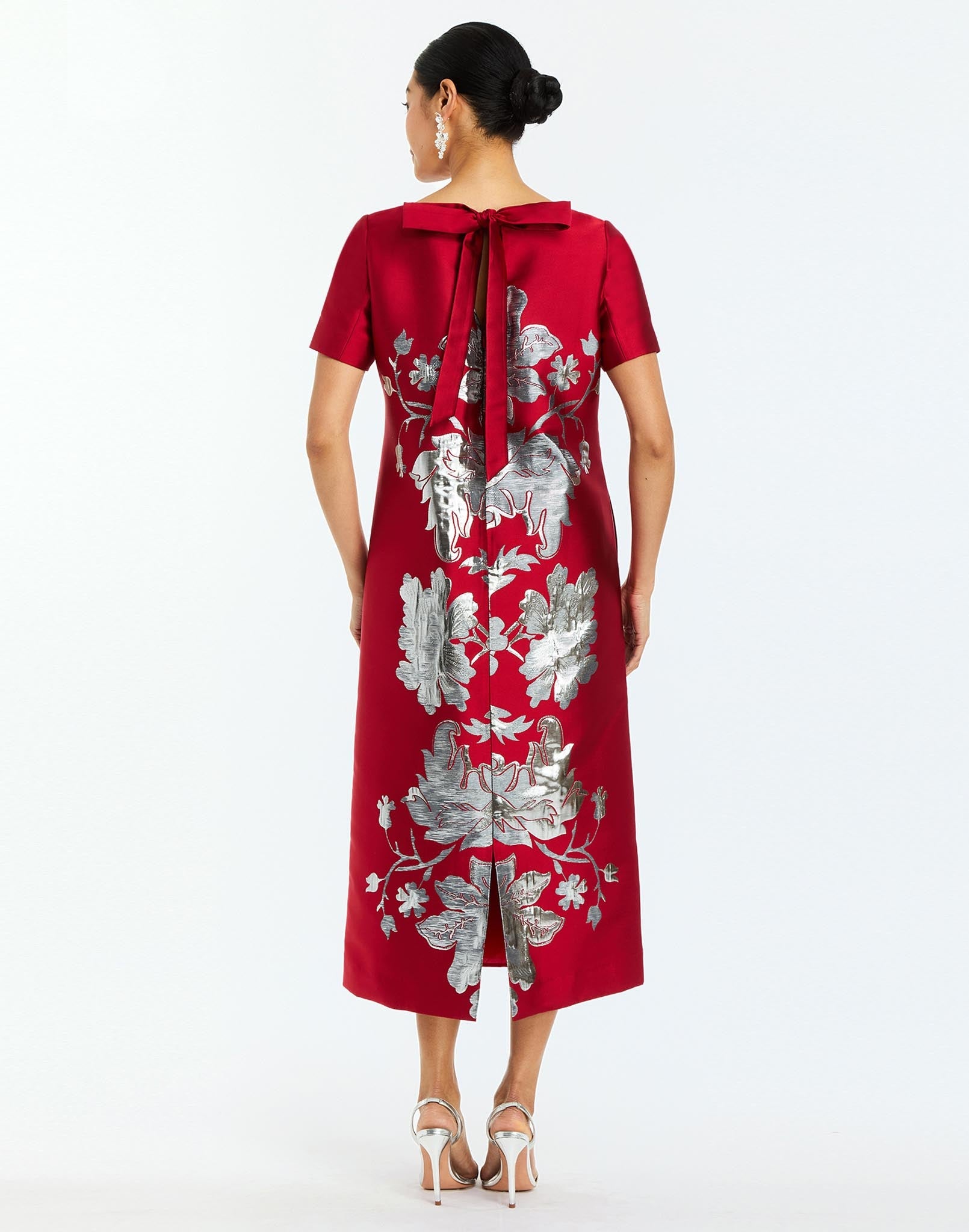 Adria Midi Dress in Burgundy Arbor back – metallic jacquard cocktail midi dress with column silhouette, boat neckline, short sleeves, and bow back detail by Mestiza New York.