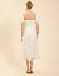 Alessandra Terno Midi Dress in Ivory broderie anglaise lace with sculptural terno sleeves, scalloped neckline, and elegant column midi silhouette.