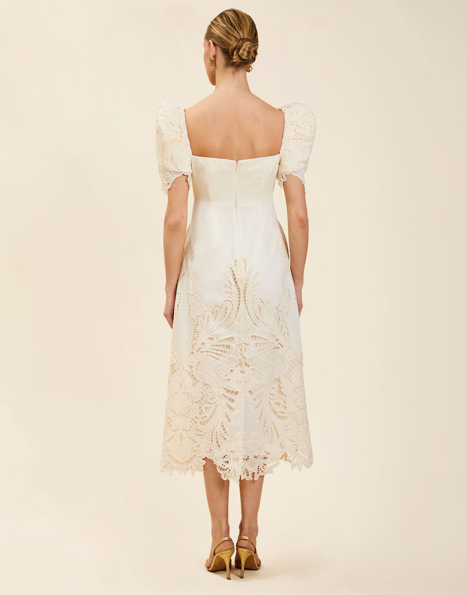 Alessandra Terno Midi Dress in Ivory broderie anglaise lace with sculptural terno sleeves, scalloped neckline, and elegant column midi silhouette.