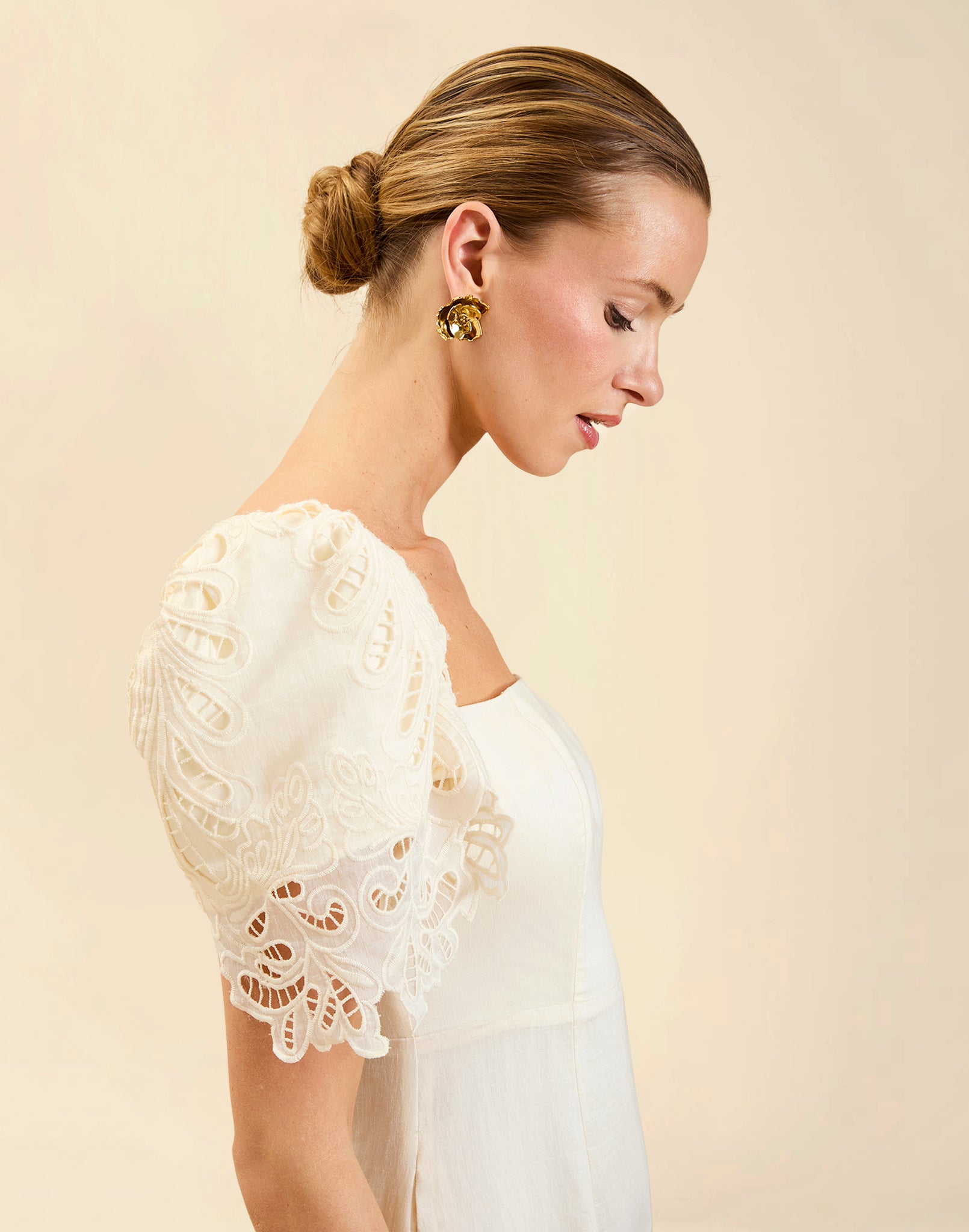 Alessandra Terno Midi Dress in Ivory broderie anglaise lace with sculptural terno sleeves, scalloped neckline, and elegant column midi silhouette.