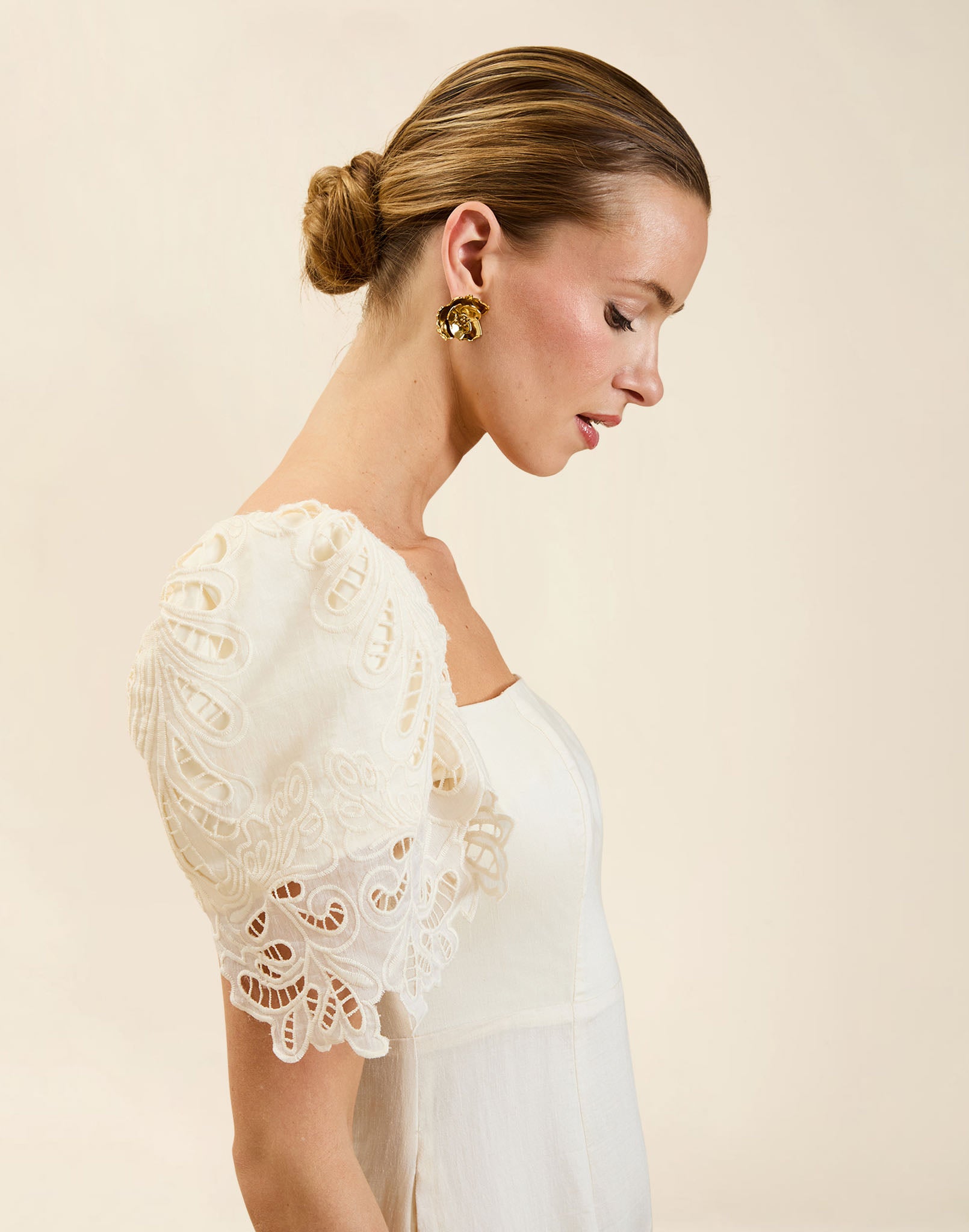 Alessandra Terno Midi Dress in Ivory broderie anglaise lace with sculptural terno sleeves, scalloped neckline, and elegant column midi silhouette.