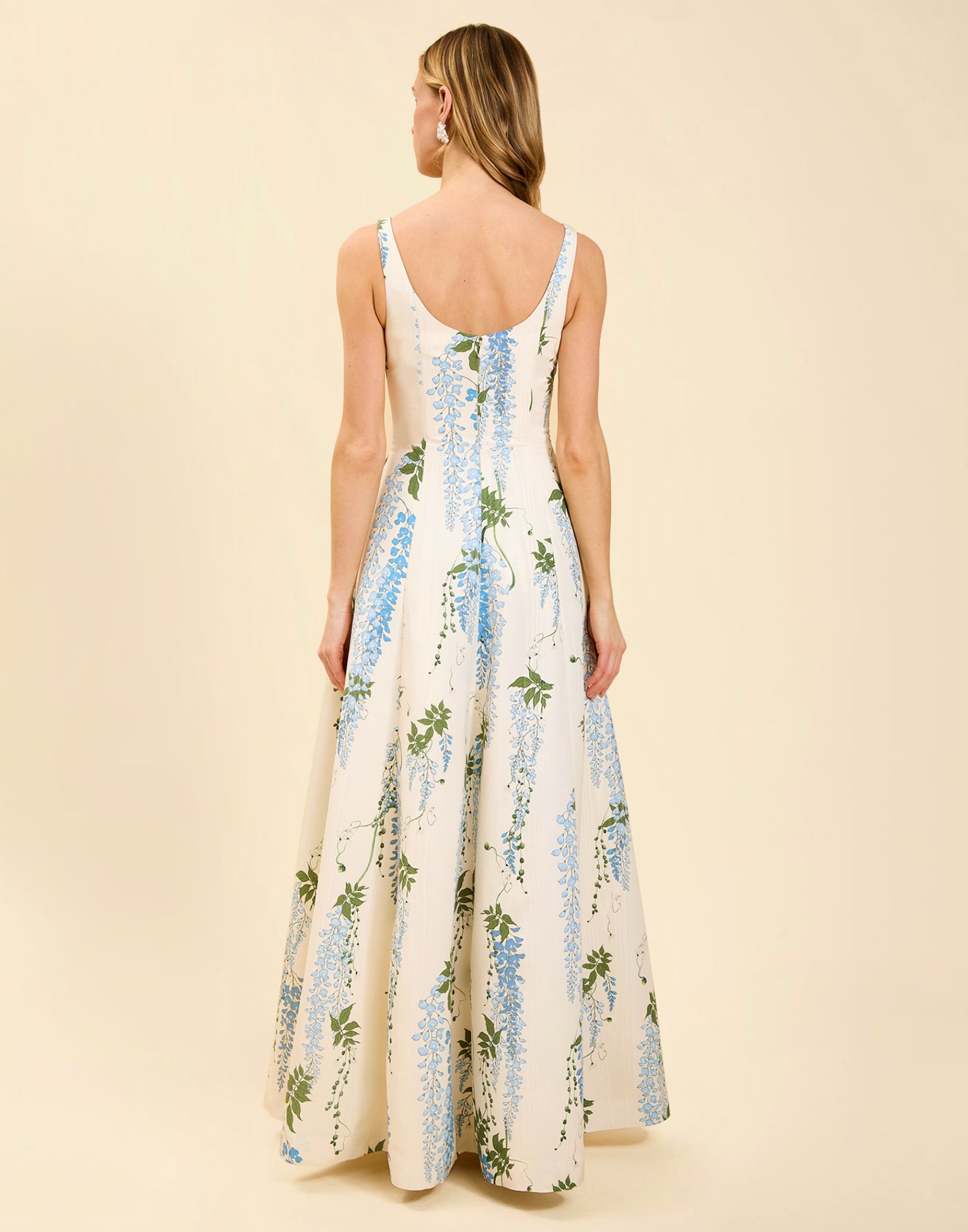 Amanda Gown in Wisteria Toile moiré with deep scoop neckline, sleeveless bodice, A-line silhouette, and hidden side pockets.