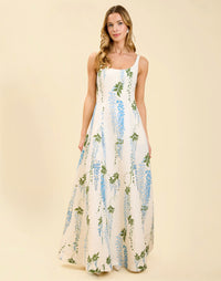 Amanda Gown in Wisteria Toile moiré with deep scoop neckline, sleeveless bodice, A-line silhouette, and hidden side pockets.