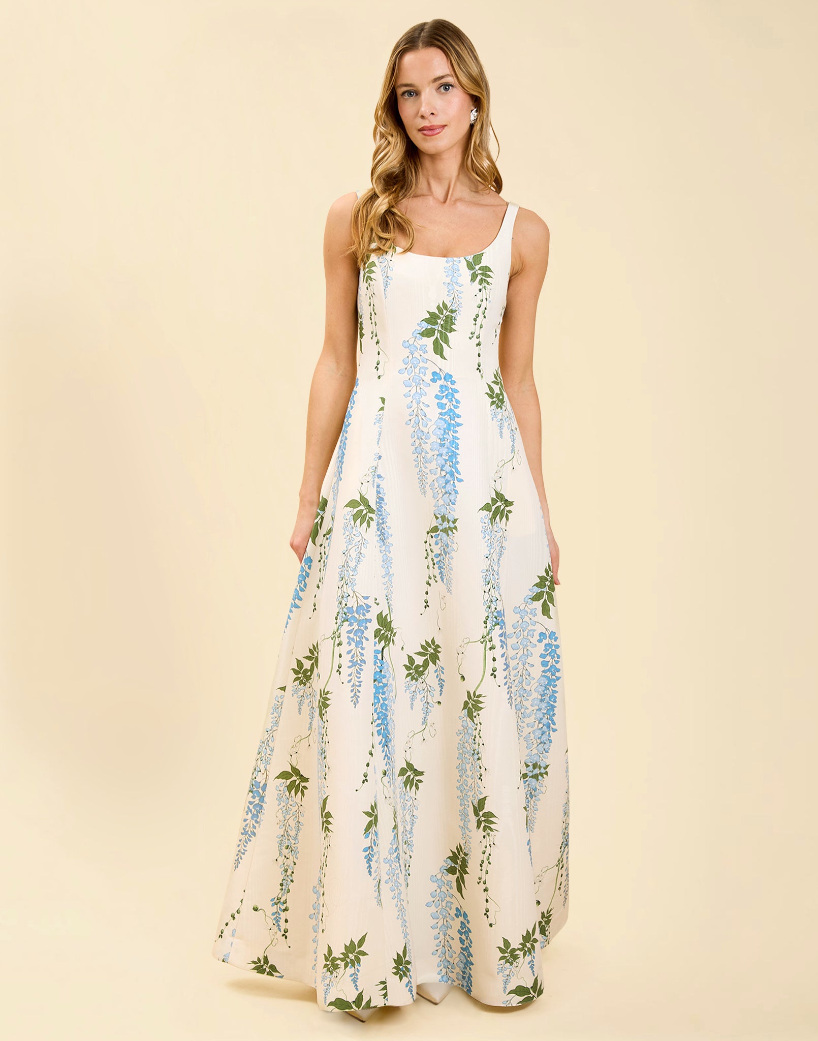 Amanda Gown in Wisteria Toile moiré with deep scoop neckline, sleeveless bodice, A-line silhouette, and hidden side pockets.