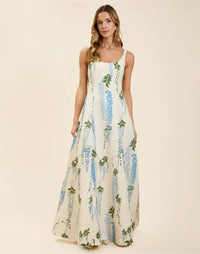 Amanda Gown in Wisteria Toile moiré with deep scoop neckline, sleeveless bodice, A-line silhouette, and hidden side pockets.