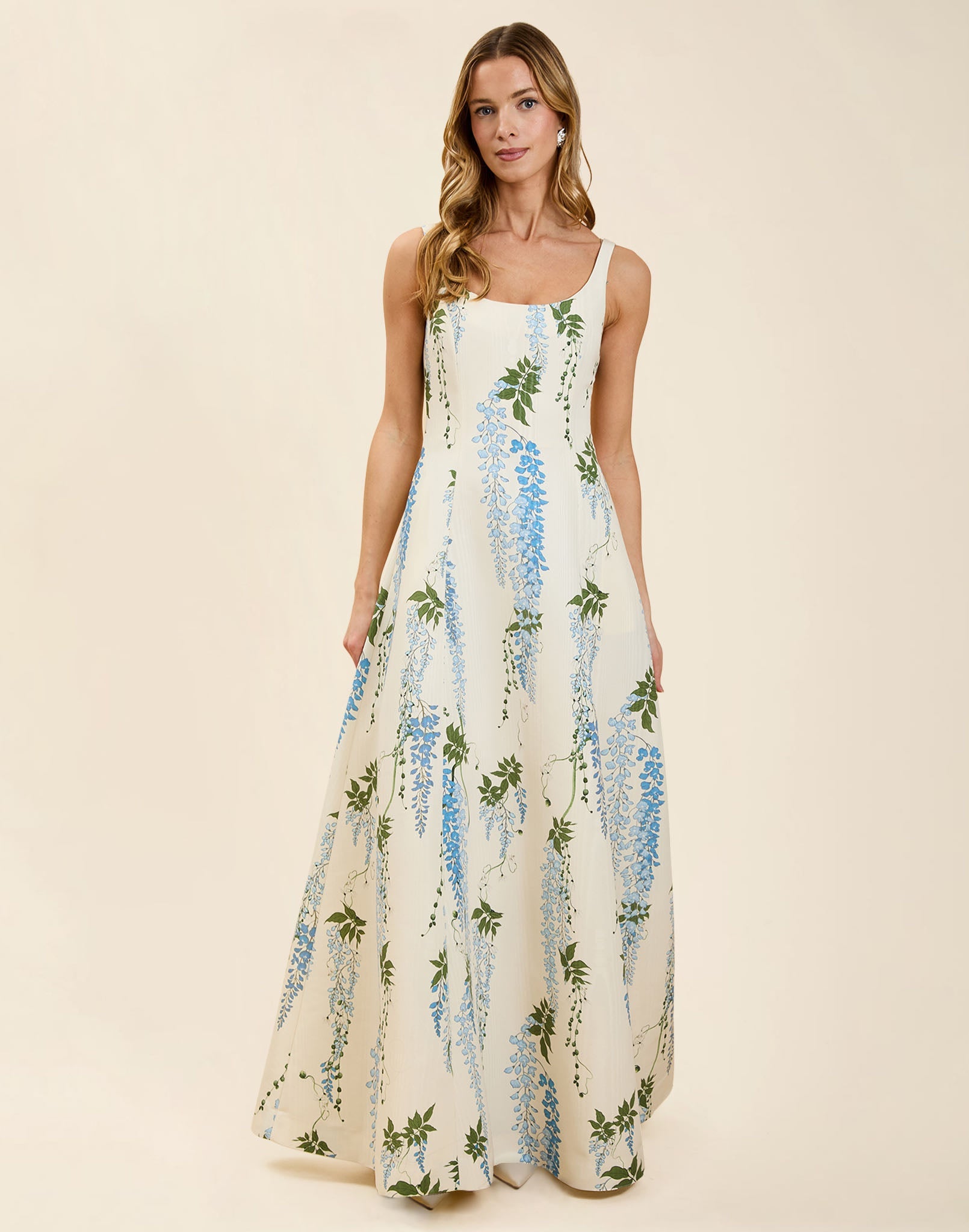 Amanda Gown in Wisteria Toile moiré with deep scoop neckline, sleeveless bodice, A-line silhouette, and hidden side pockets.