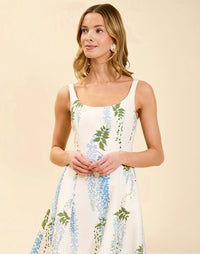 Amanda Gown in Wisteria Toile moiré with deep scoop neckline, sleeveless bodice, A-line silhouette, and hidden side pockets.
