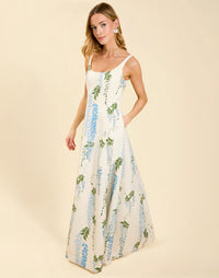 Amanda Gown in Wisteria Toile moiré with deep scoop neckline, sleeveless bodice, A-line silhouette, and hidden side pockets.