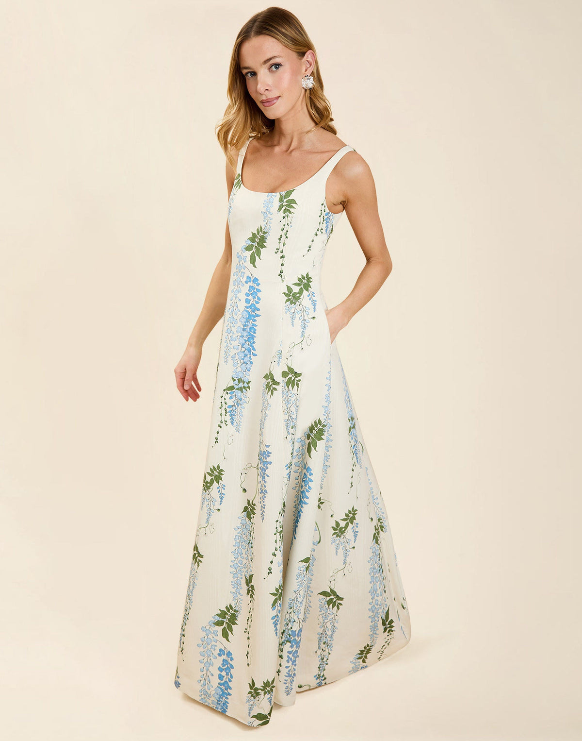 Amanda Gown in Wisteria Toile moiré with deep scoop neckline, sleeveless bodice, A-line silhouette, and hidden side pockets.