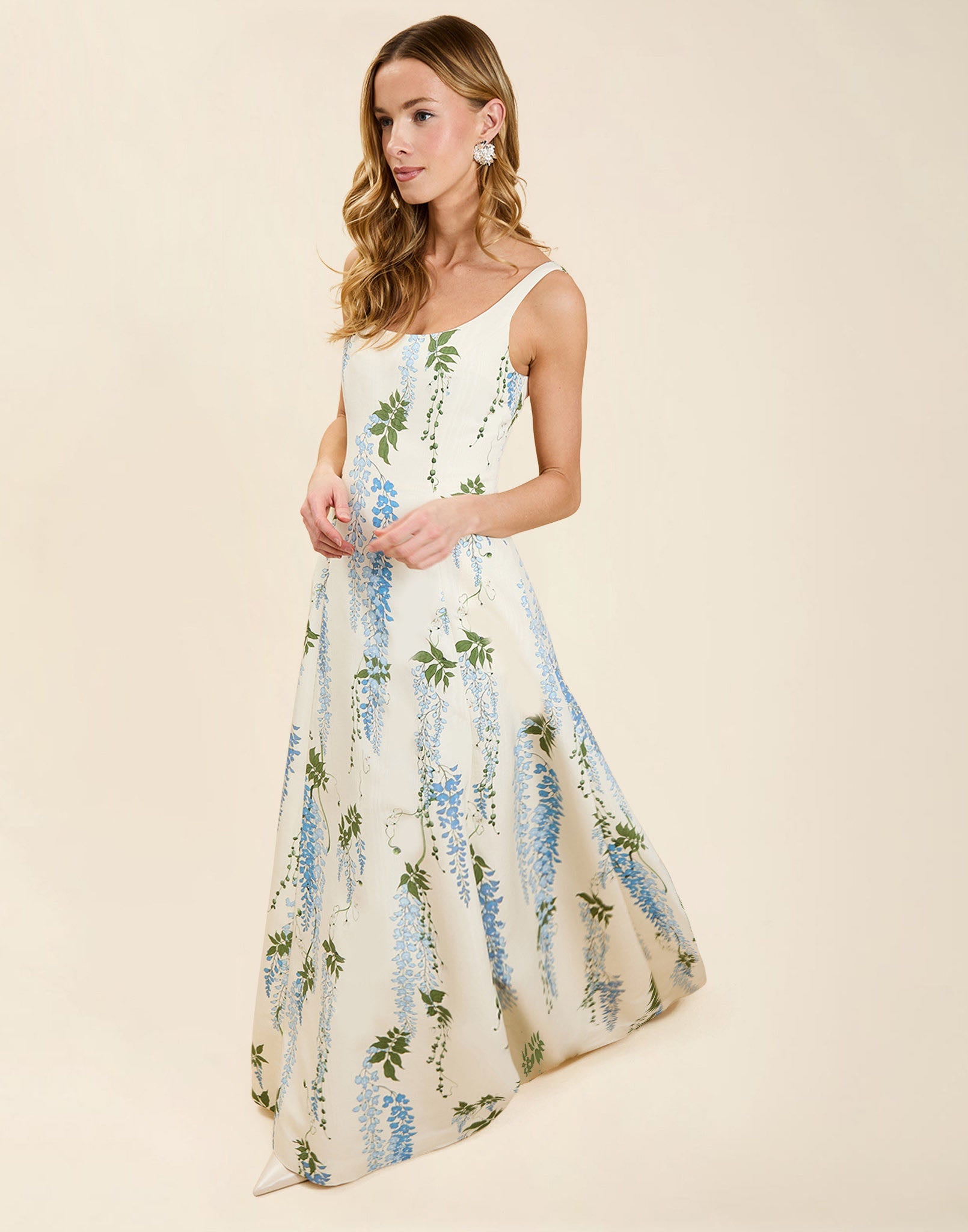 Amanda Gown in Wisteria Toile moiré with deep scoop neckline, sleeveless bodice, A-line silhouette, and hidden side pockets.