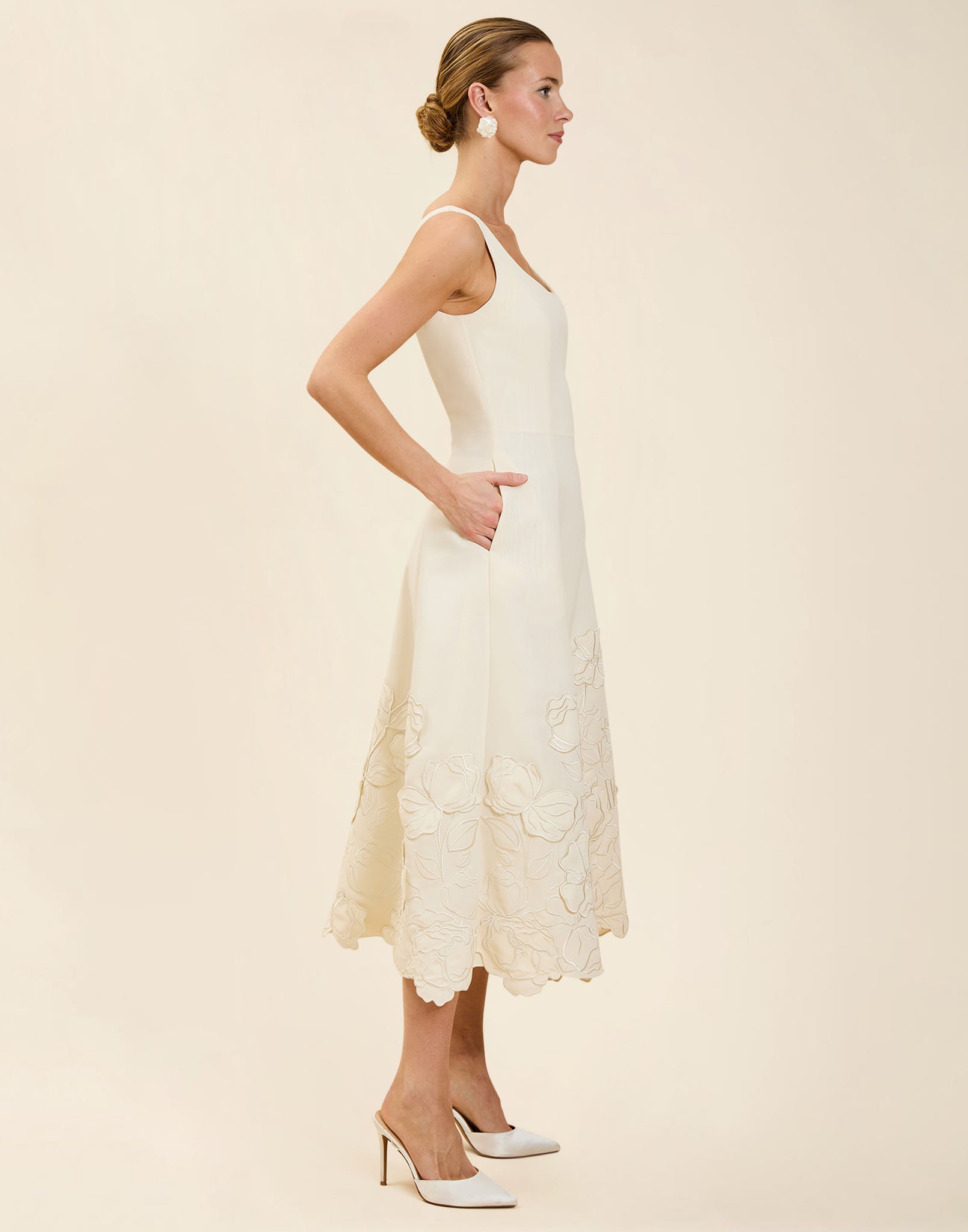Amanda Midi Dress in Ivory moiré with tonal floral embroidery, scoop neckline, sleeveless bodice, and elegant A-line midi silhouette.