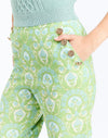 Detail - Antonella Pants in Trellis Verte is a printed straight-leg pants with decorative buttons and side zip.