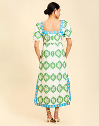 Apollo Convertible Midi Dress in Palm Bay Blue linen with square neckline, removable sleeves, and empire waist silhouette.