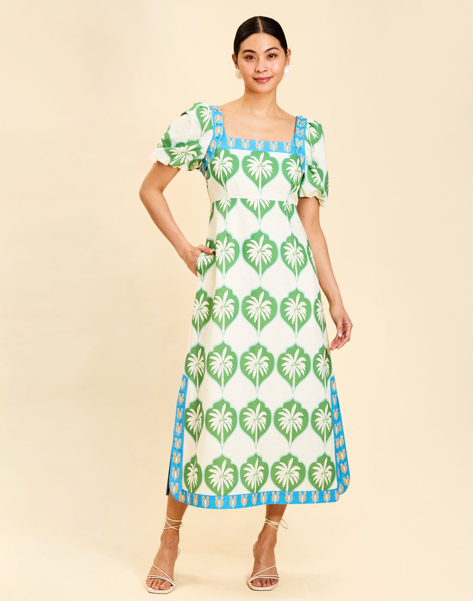 Apollo Convertible Midi Dress in Palm Bay Blue linen with square neckline, removable sleeves, and empire waist silhouette.