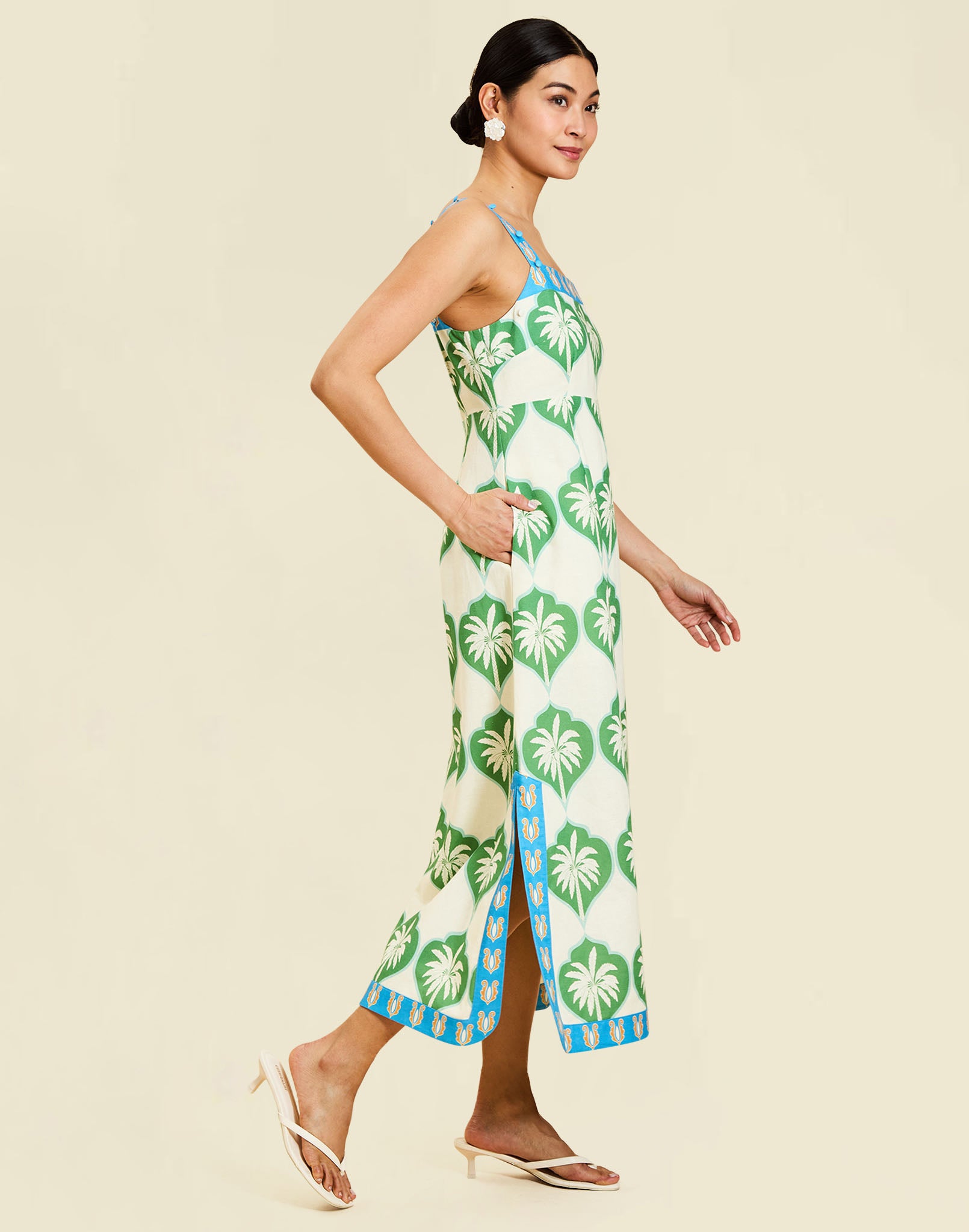 Apollo Convertible Midi Dress in Palm Bay Blue linen with square neckline, removable sleeves, and empire waist silhouette.