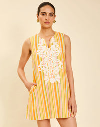 Belize Shift Mini Dress in Sunset Ribbons linen with embroidery detail, notch collar, sleeveless shift silhouette, and side pockets.