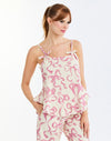 Bella Bow Pajama Set in Ivory/Pink Bows detail – printed cotton pajama set with ruffle-hem tank top and pants, elastic waistband, and pockets by Mestiza New York.