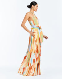 Side - Bijou Halter Gown in Fresco Tides is a chain-neck halter gown with wrap sash, gathered bodice, and sweeping jersey skirt.