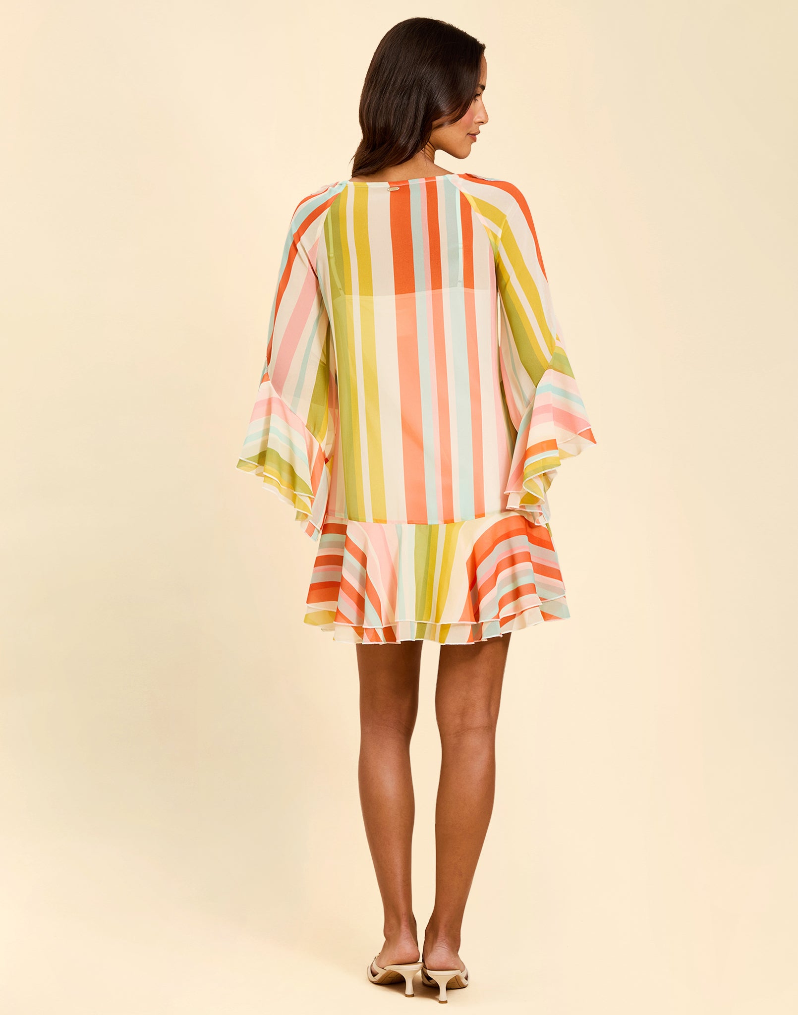 Bimini Ruffle Caftan Mini Dress in Paradise Stripe chiffon with cascading ruffles, tie neckline, and flowy mini silhouette.