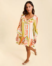 Bimini Ruffle Caftan Mini Dress in Paradise Stripe chiffon with cascading ruffles, tie neckline, and flowy mini silhouette.
