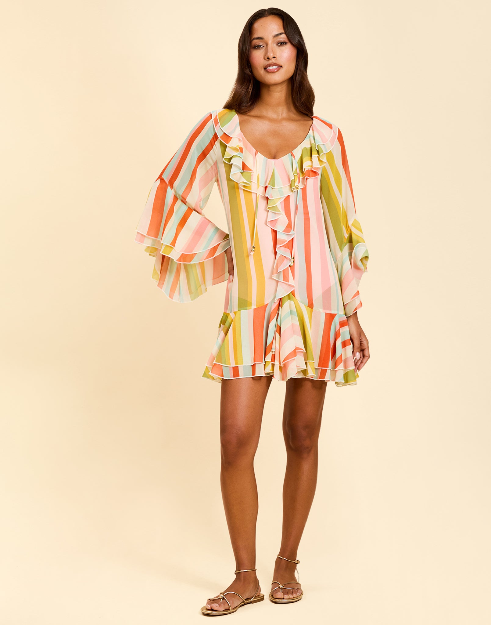 Bimini Ruffle Caftan Mini Dress in Paradise Stripe chiffon with cascading ruffles, tie neckline, and flowy mini silhouette.