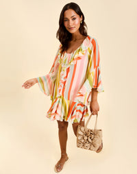 Bimini Ruffle Caftan Mini Dress in Paradise Stripe chiffon with cascading ruffles, tie neckline, and flowy mini silhouette.