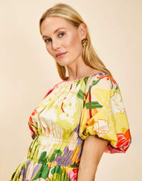 Breakfast Smocked Mini Dress in Primrose Midnight poplin with boat neckline, smocked bodice, balloon sleeves, and side pockets.