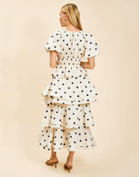 Breakfast Smocked Top in Polka Dot poplin with boat neckline, smocked bodice, balloon sleeves, and peplum hem.