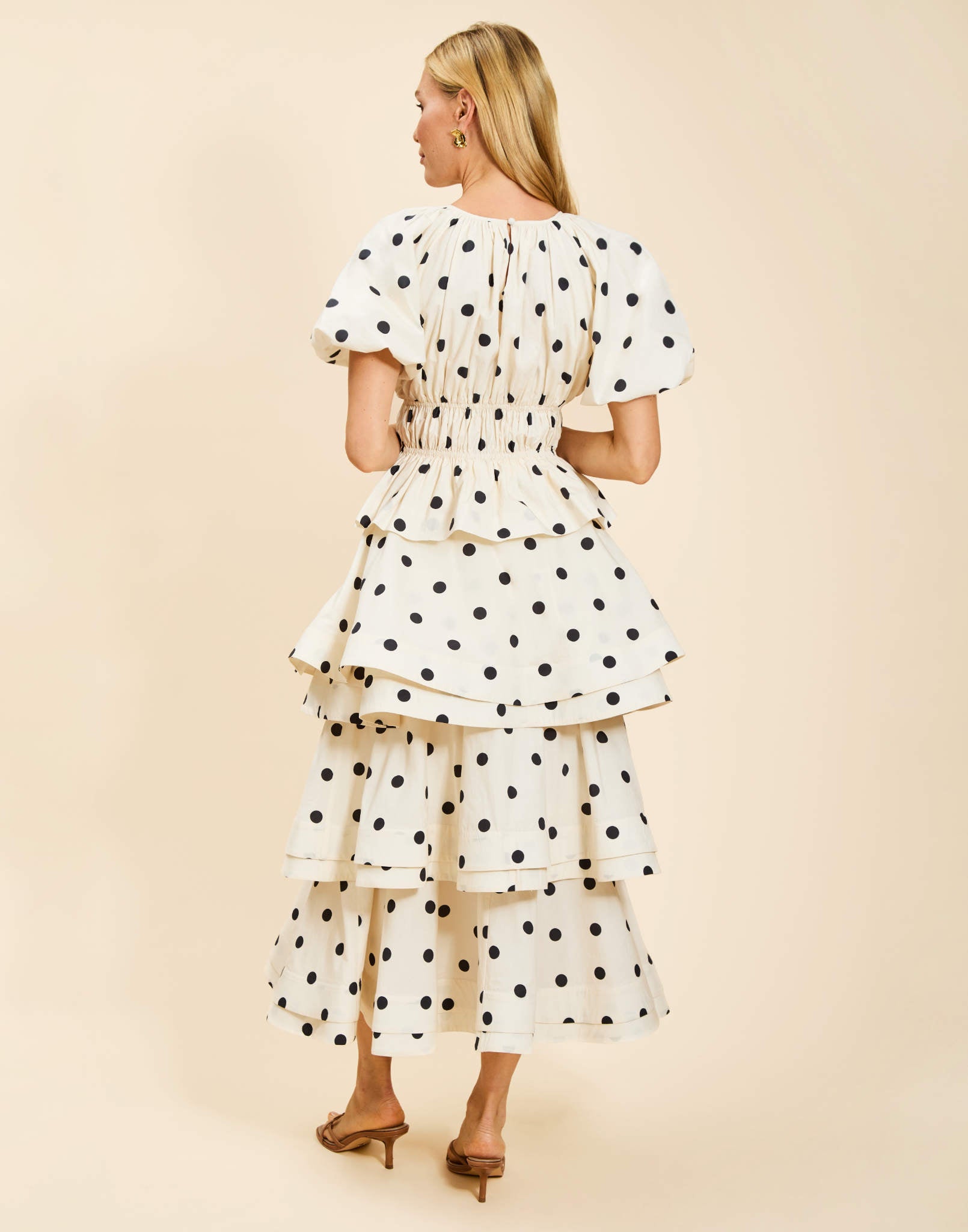 Breakfast Smocked Top in Polka Dot poplin with boat neckline, smocked bodice, balloon sleeves, and peplum hem.