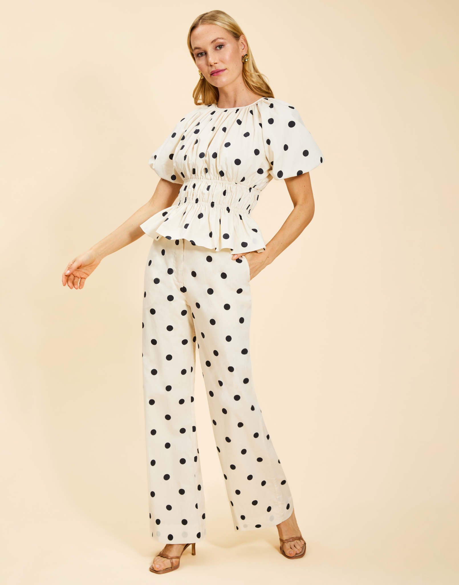Breakfast Smocked Top in Polka Dot poplin with boat neckline, smocked bodice, balloon sleeves, and peplum hem.