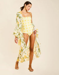 Model wearing Bria Convertible One Piece in Gardenia Lattice with removable belt and adjustable straps.