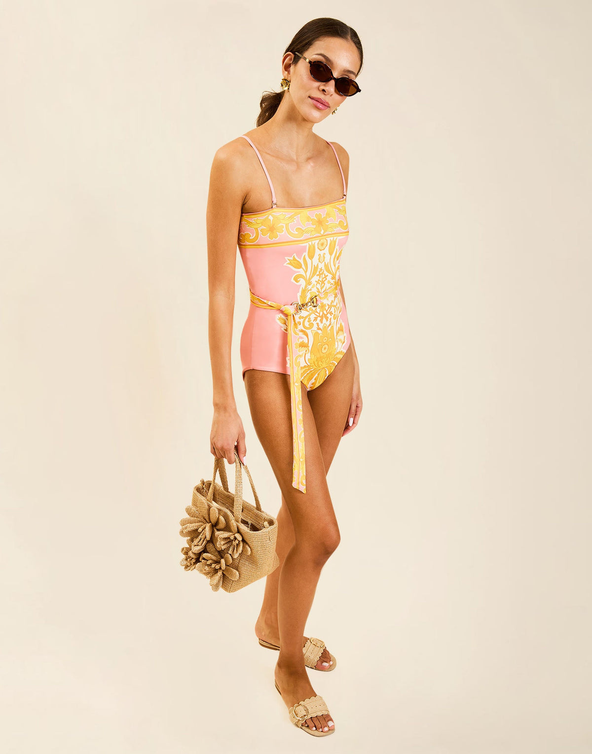 Model wearing Bria Convertible One Piece in Florentine Blush with removable belt and adjustable straps.