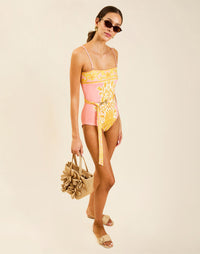 Model wearing Bria Convertible One Piece in Florentine Blush with removable belt and adjustable straps.
