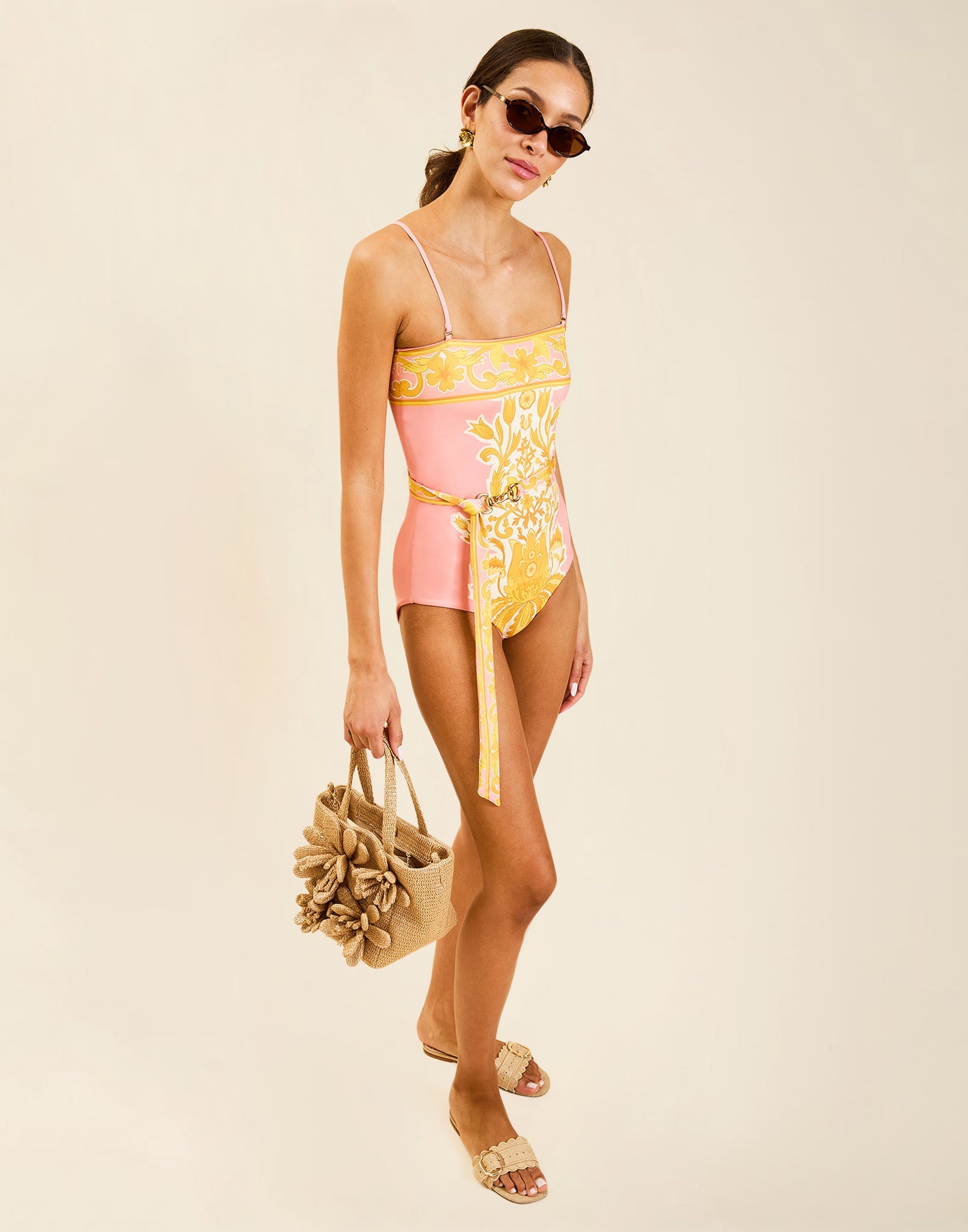 Model wearing Bria Convertible One Piece in Florentine Blush with removable belt and adjustable straps.