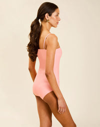 Model wearing Bria Convertible One Piece in Florentine Blush with removable belt and adjustable straps.