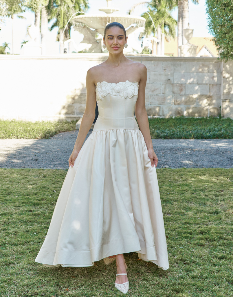 Nereida Dropwaist Gown in Ivory taffeta with strapless neckline, tonal floral embroidery, drop-waist silhouette, and high-low skirt with train.