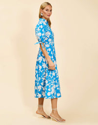 Brooklyn Midi Dress in Huckleberry Blue poplin with mandarin collar, button-front placket, adjustable tie cuffs, and A-line midi skirt.