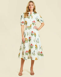 Brooklyn Midi Dress in Verano Meadows cotton poplin with mandarin collar, balloon sleeves, tie cuffs, and a fit-and-flare silhouette.